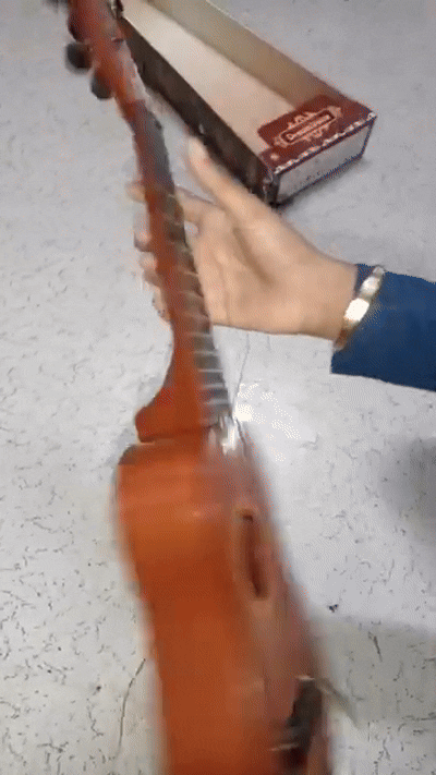 Mini Wooden Finish Guitar Toy for Kids – 4 String Musical Instrument Ukulele Style Learning Toy